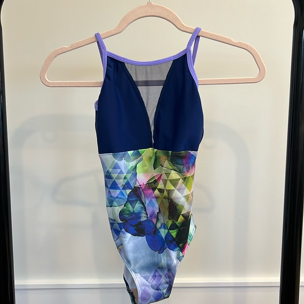 Elevé girl’s leotard size L. Multicolor design. Pristine condition.